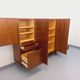 High Scandinavian modernist vintage sideboard in teak and black metal.