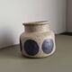 Mid-century modern stoneware vase with cobalt blue dots.