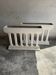 Pair of sculptural cast concrete planters in Off-White, mid-century brutalist style, long and rectangular.