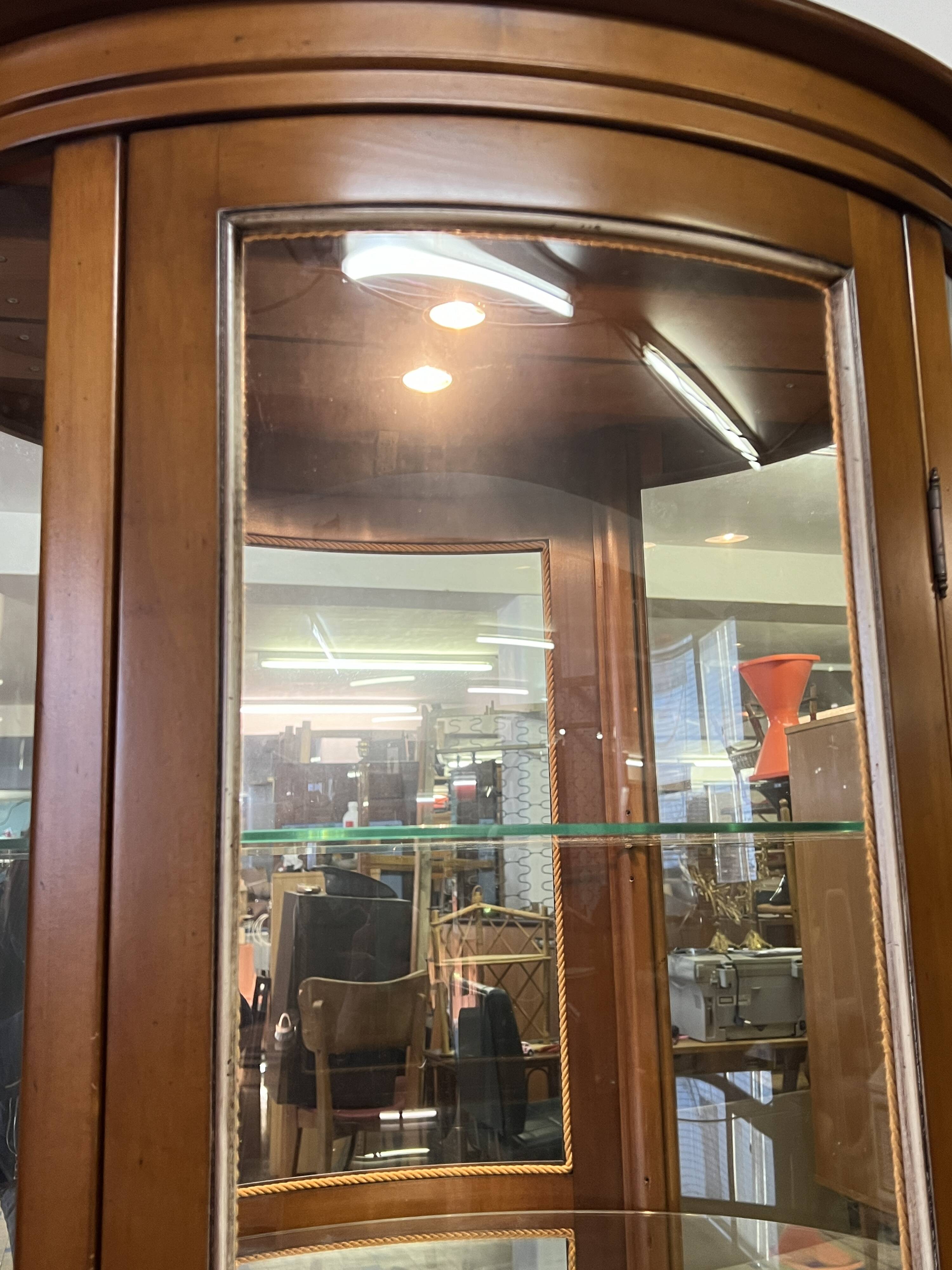 Wooden display case and half-moon mirror