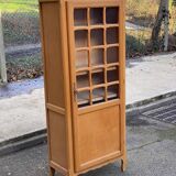 Parisian glass-fronted wardrobe in light wood from the 1960s.