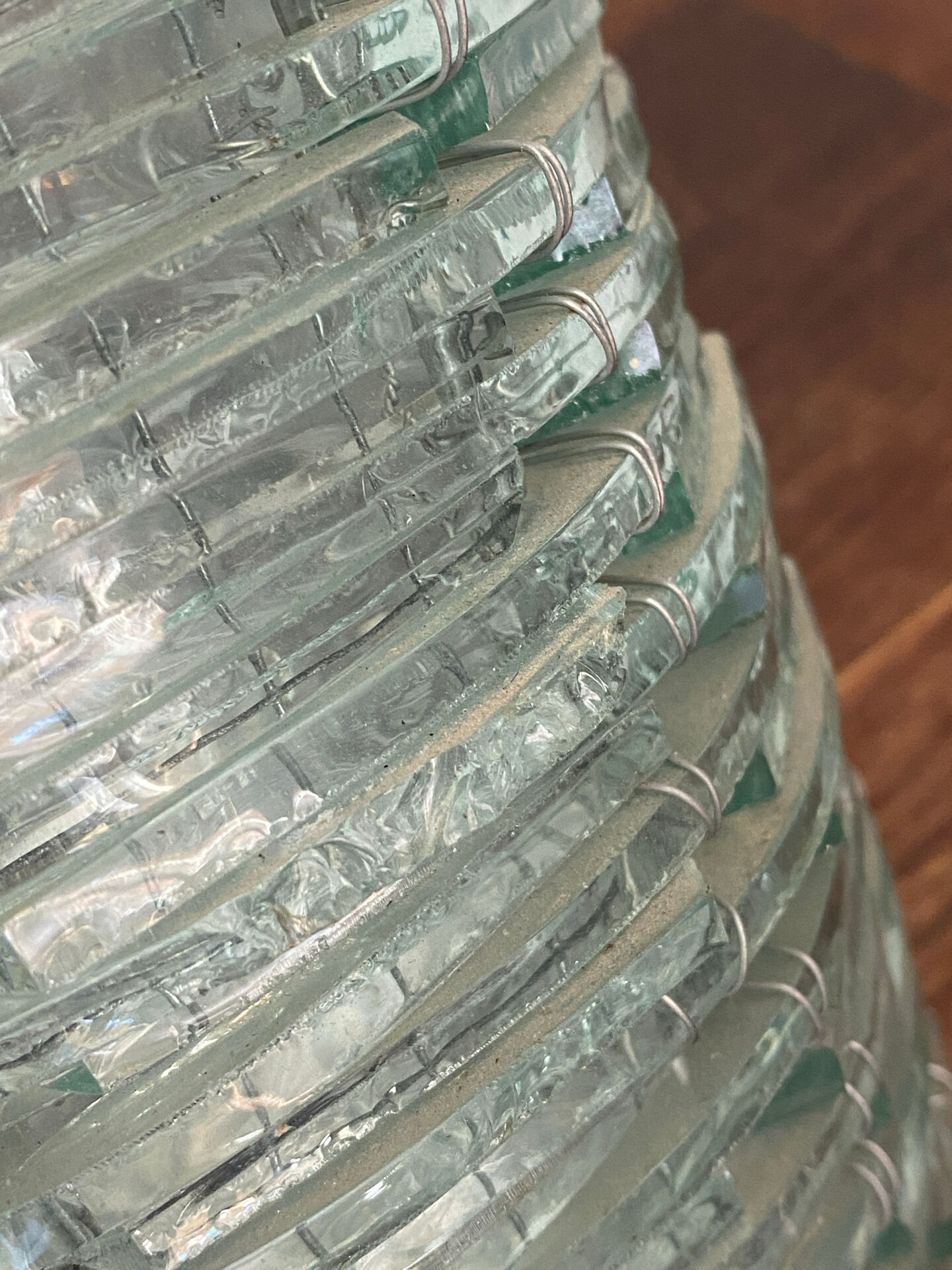Blue-tinted glass lamp and wire.