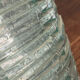 Blue-tinted glass lamp and wire.