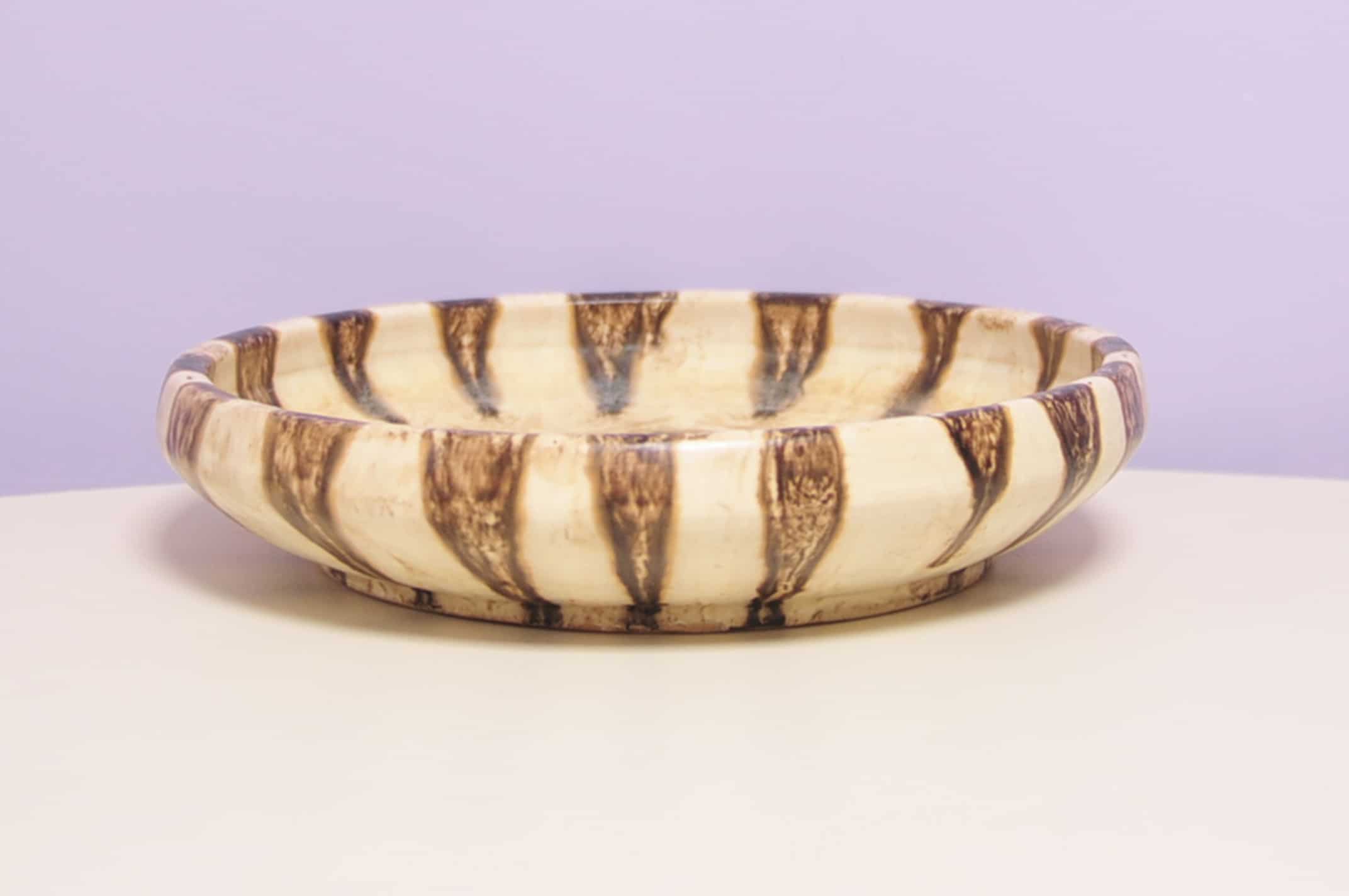 Beige round bowl with dots