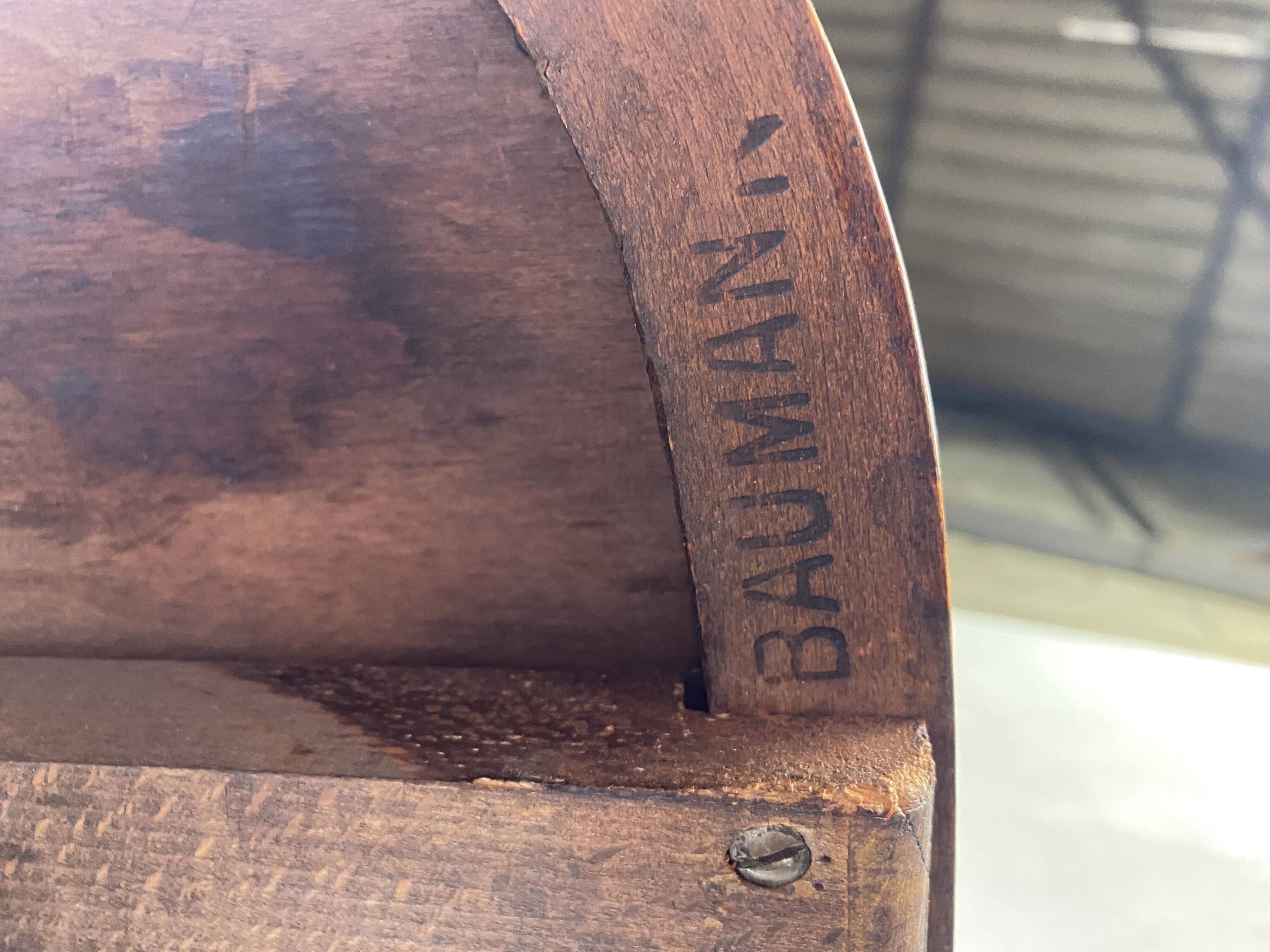 Baumann rotating wooden armchair