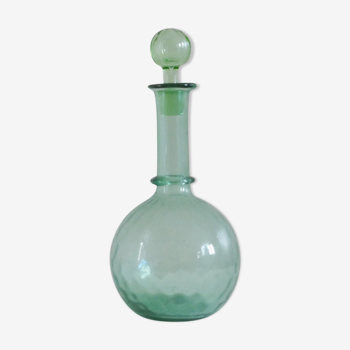 Vintage sweet decanter made of green glass