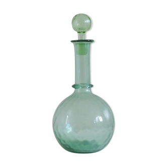 Vintage sweet decanter made of green glass