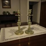 Pair of bronze torches chiseled with foliage, 19th century