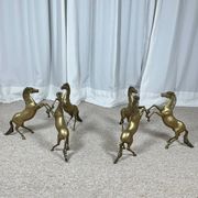 Hollywood Regency style coffee table, 6 patinated brass horses and glass top, 1970.