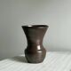 Dark brown ceramic vase, flared shape, smooth finish, classic style