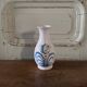 Nevers faience vase, 18th century, floral decoration on a white background