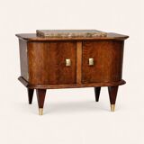Small vintage 1950s wooden buffet with marble top and tapered legs.