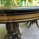 Extendable oval dining table in lacquered Chinoiserie style from the year.