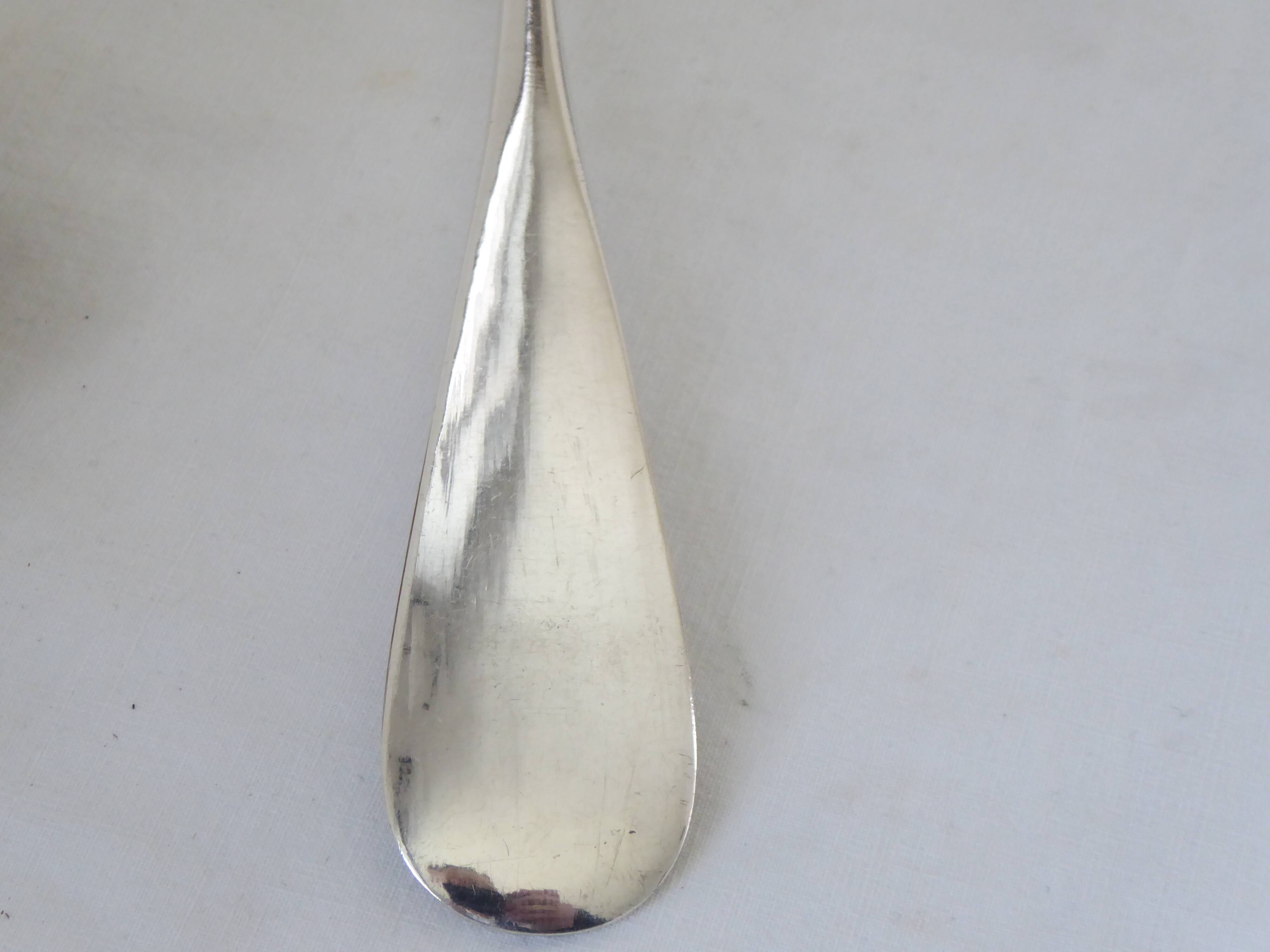 Silver metal serving spoon
