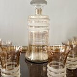Carafe liqueur service with 8 gilded crystal glasses from the 1930s