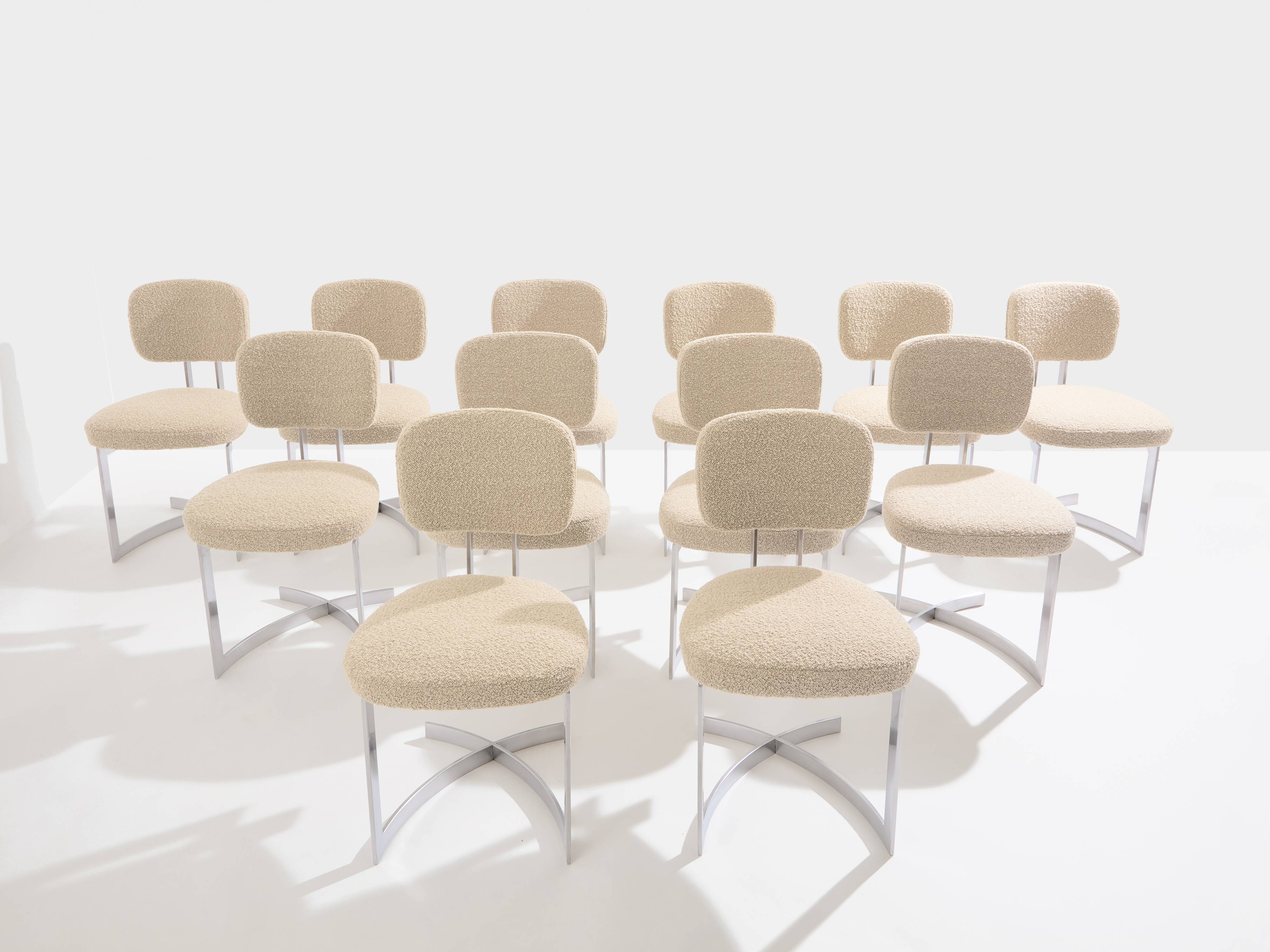 Paul Legeard set of 12 stainless steel and curly wool chairs 1970