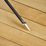 Black glass and brass coffee table in the 1960s