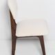 20th-century walnut and light cream boucle butterfly chair, Europe, 1960.