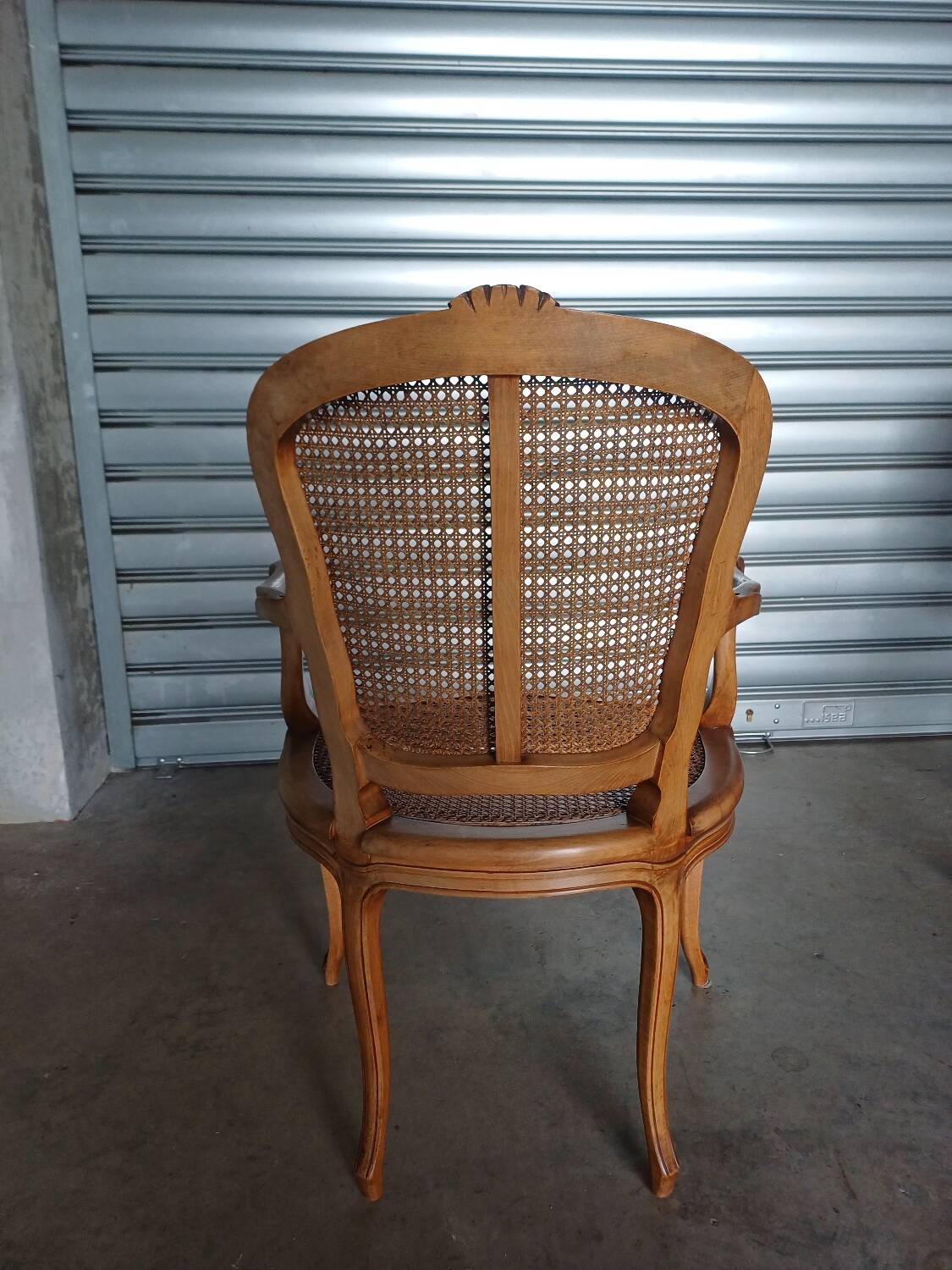 Pair of caned cabriolet armchairs