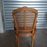 Paire de fauteuils cabriolets cannés