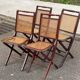 4 cane-seated solid wood folding chairs to be repaired.