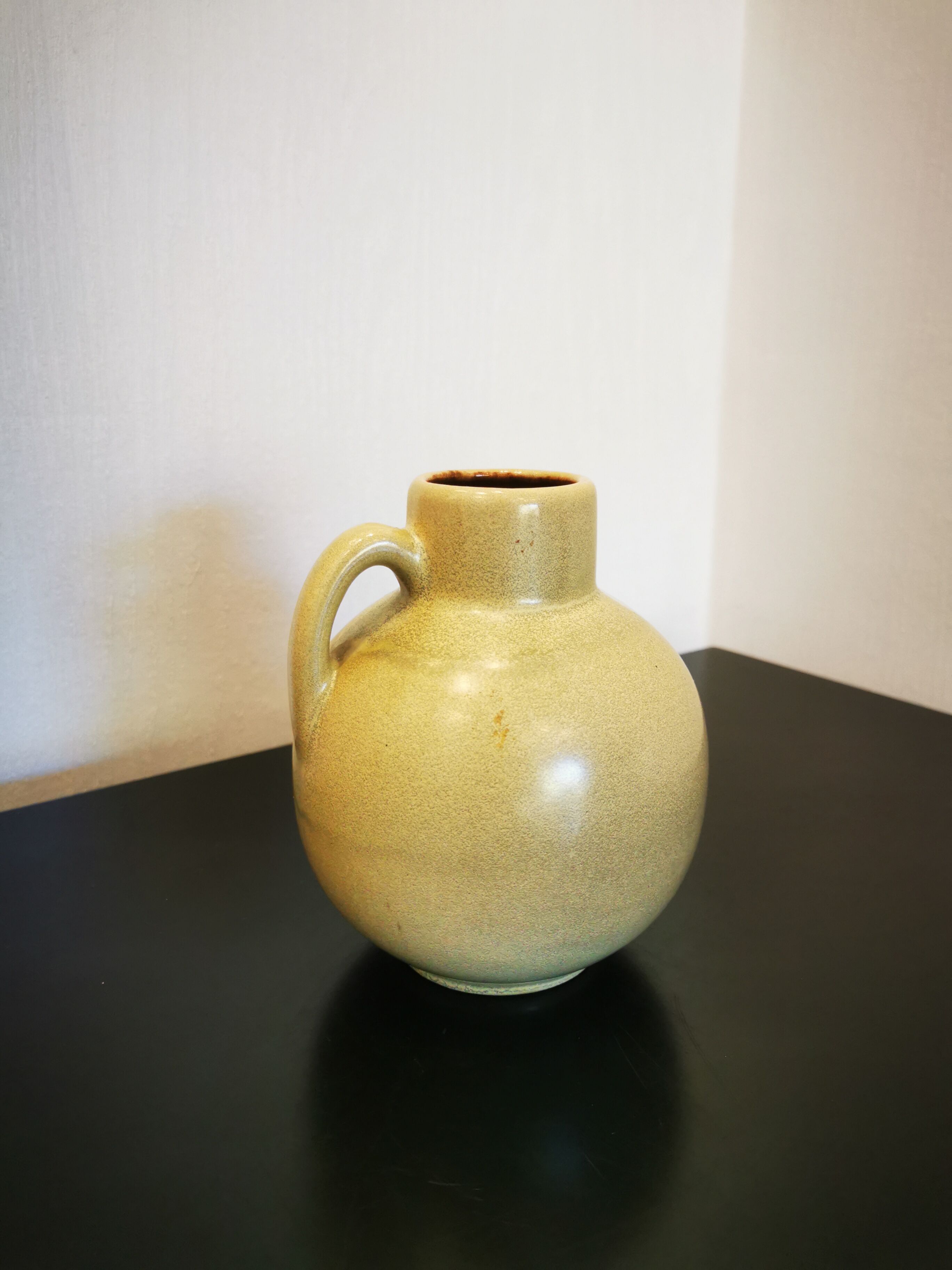 Vintage sleek handle vase
