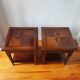 Pair of French-made side tables.