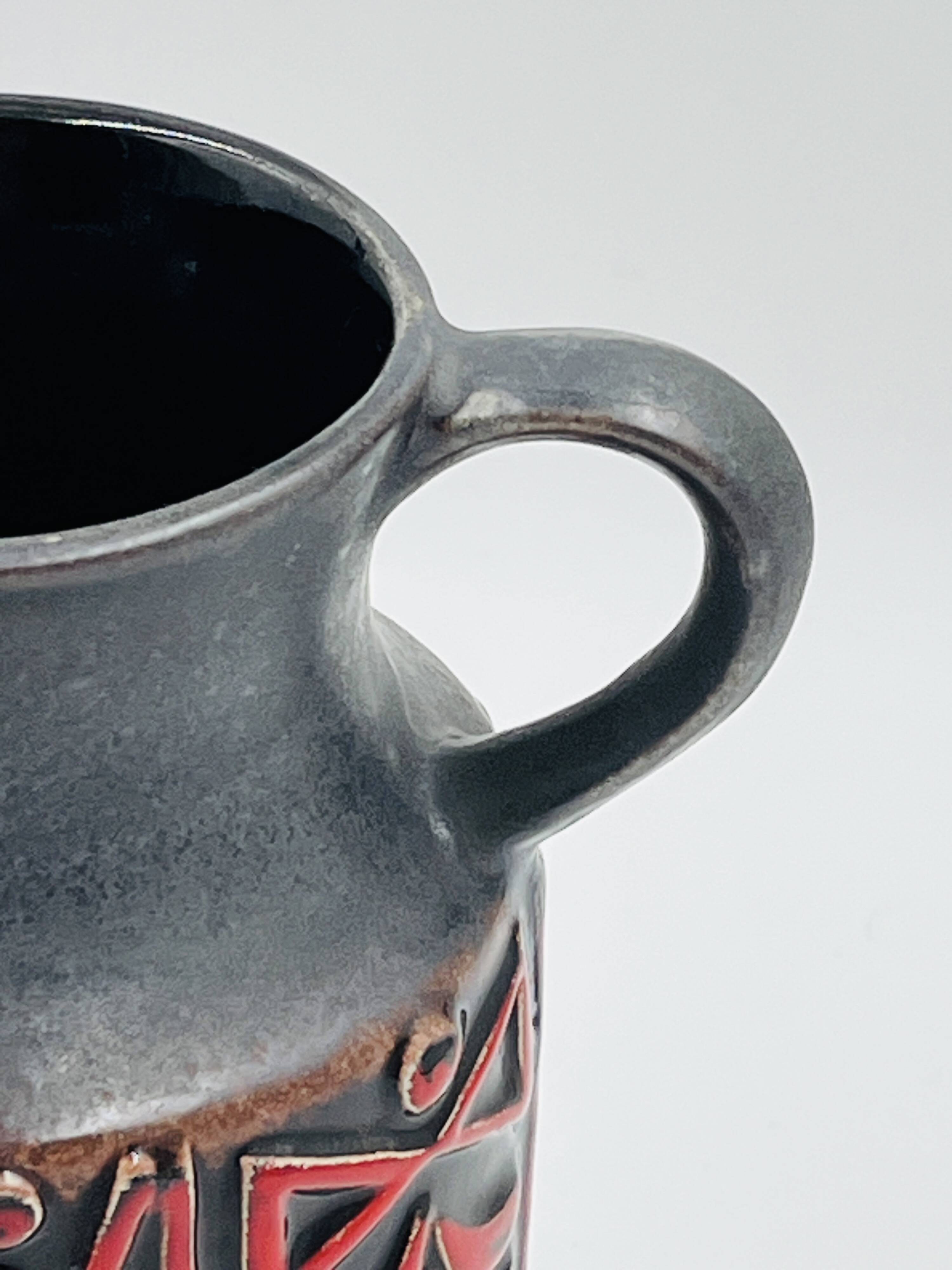 Vase West Germany, ceramic relief, red, 1970s.