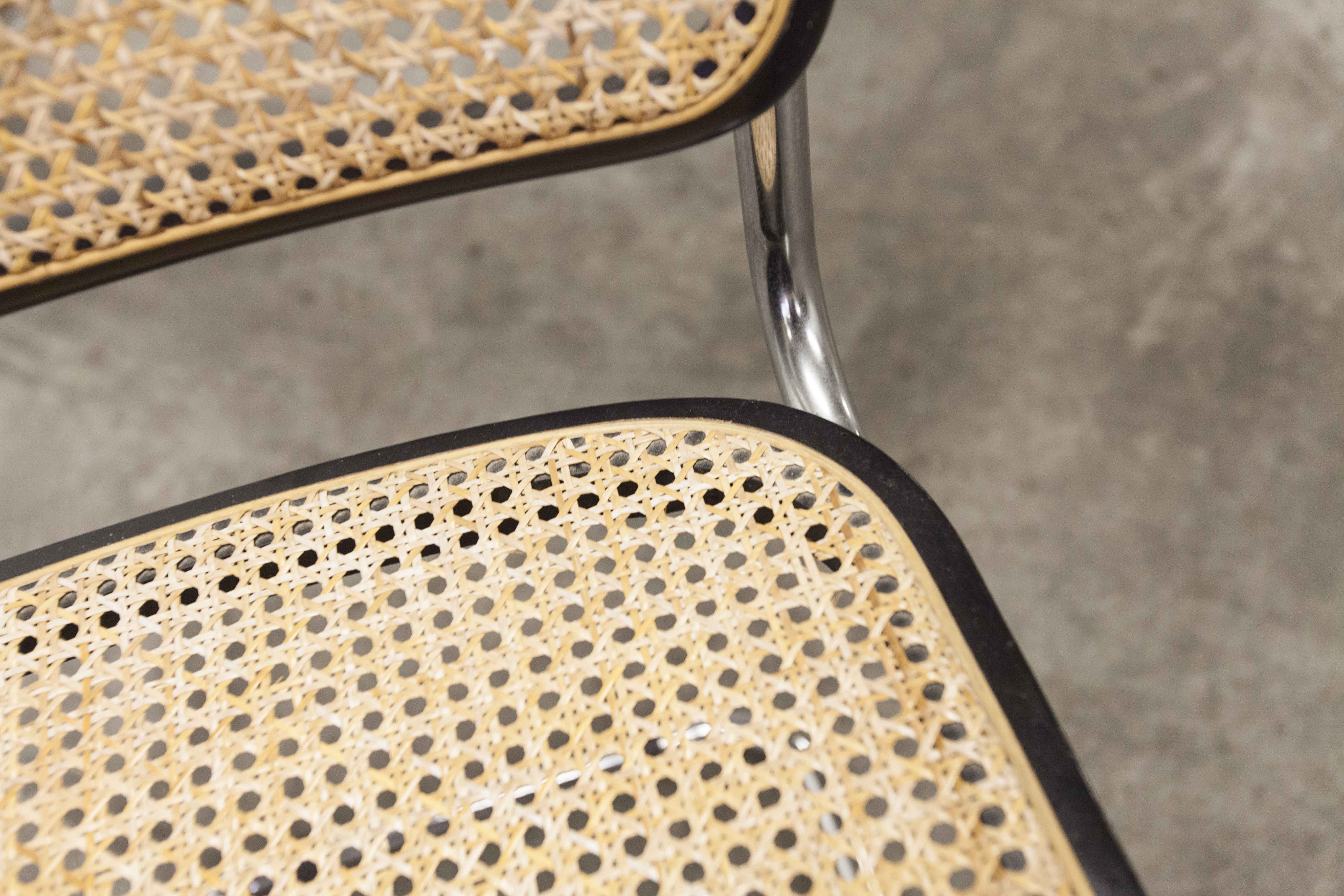 Pair of black Breuer b32 chairs and cannage