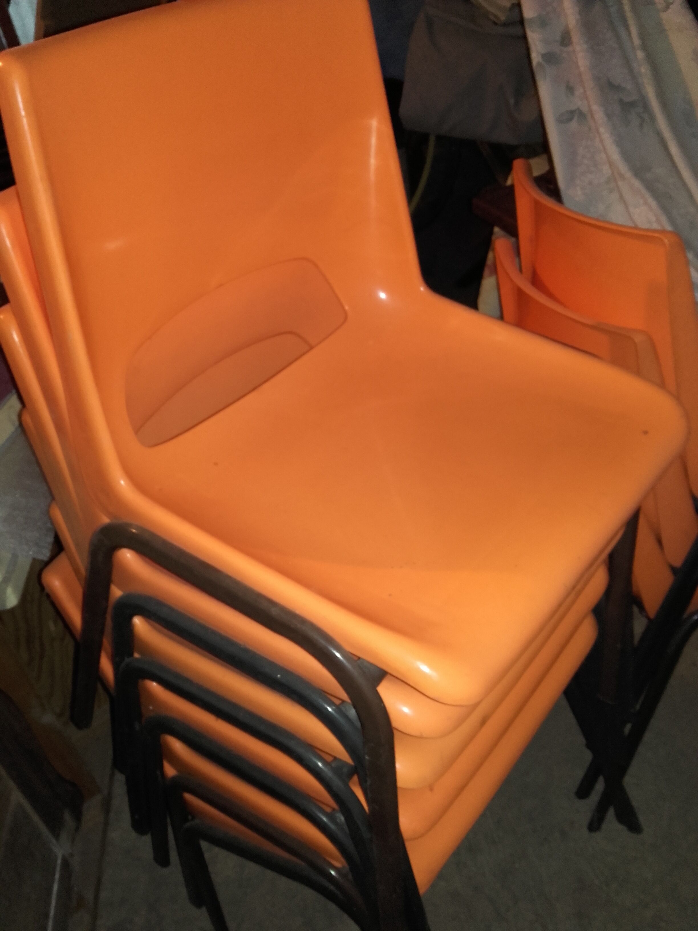 9 vintage orange plastic adult chairs