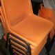 9 vintage orange plastic adult chairs
