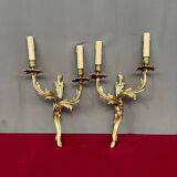 Paire d'appliques en bronze massif doré.