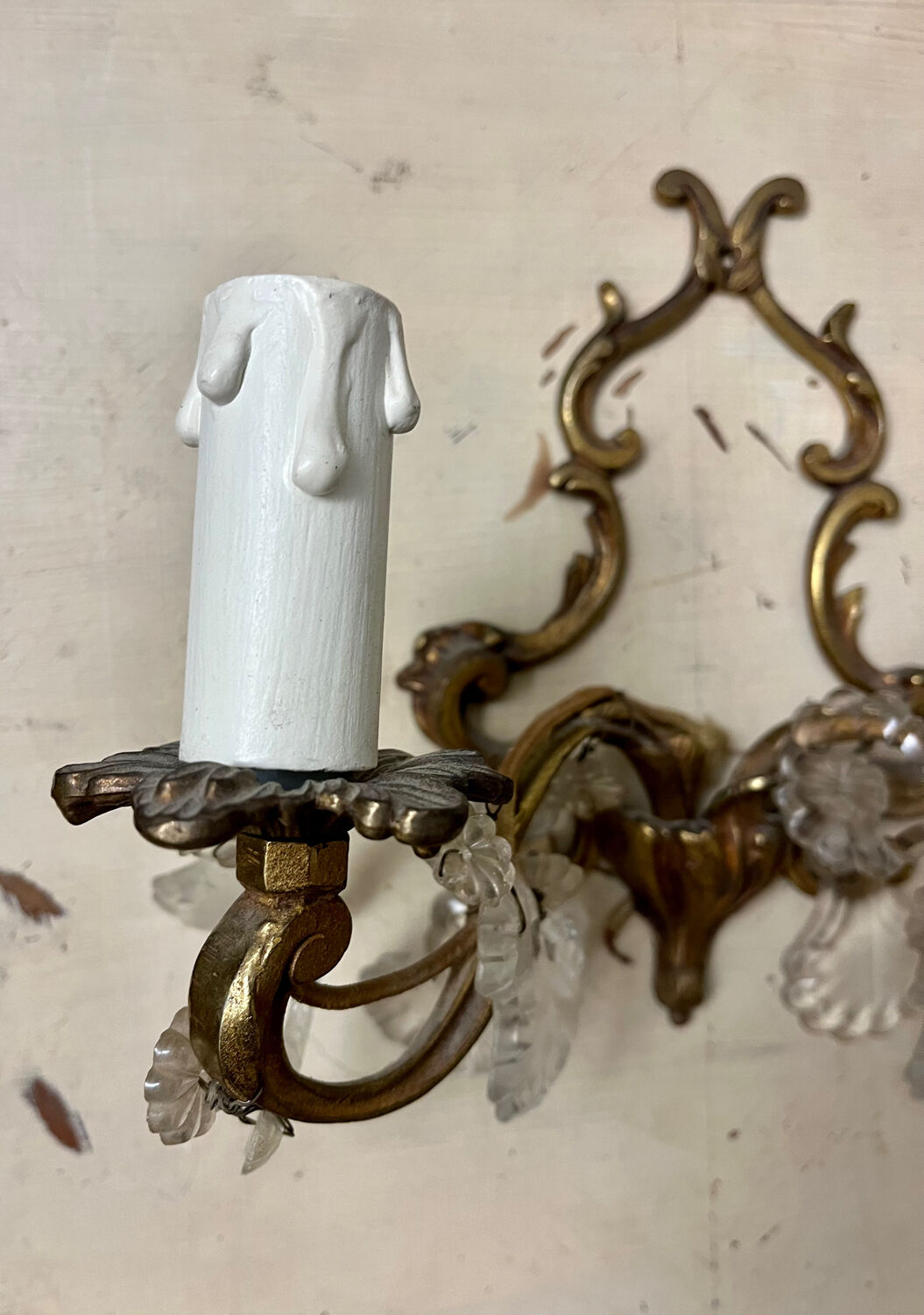 Louis XV style two-light bronze wall light with antique tassels