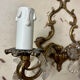 Louis XV style two-light bronze wall light with antique tassels