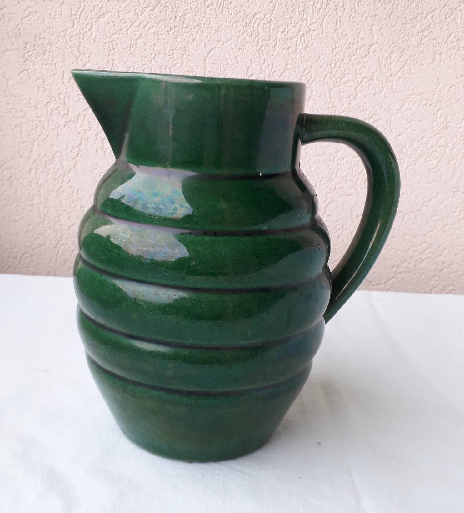 Green ceramic pitcher