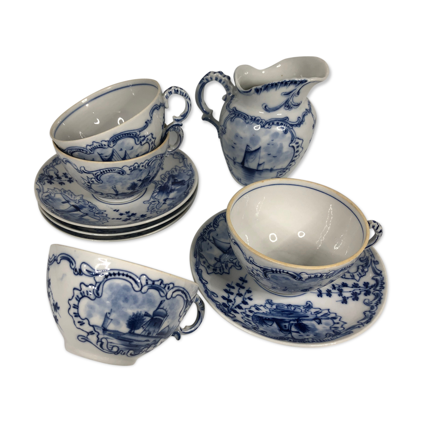 4 old cups and under Rauenstein Delft cups