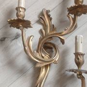 Pair of original antique bronze wall sconces.