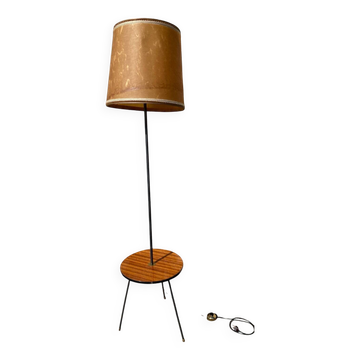 Vintage 1960s floor lamp with black tripod base and round varnished wooden shelf