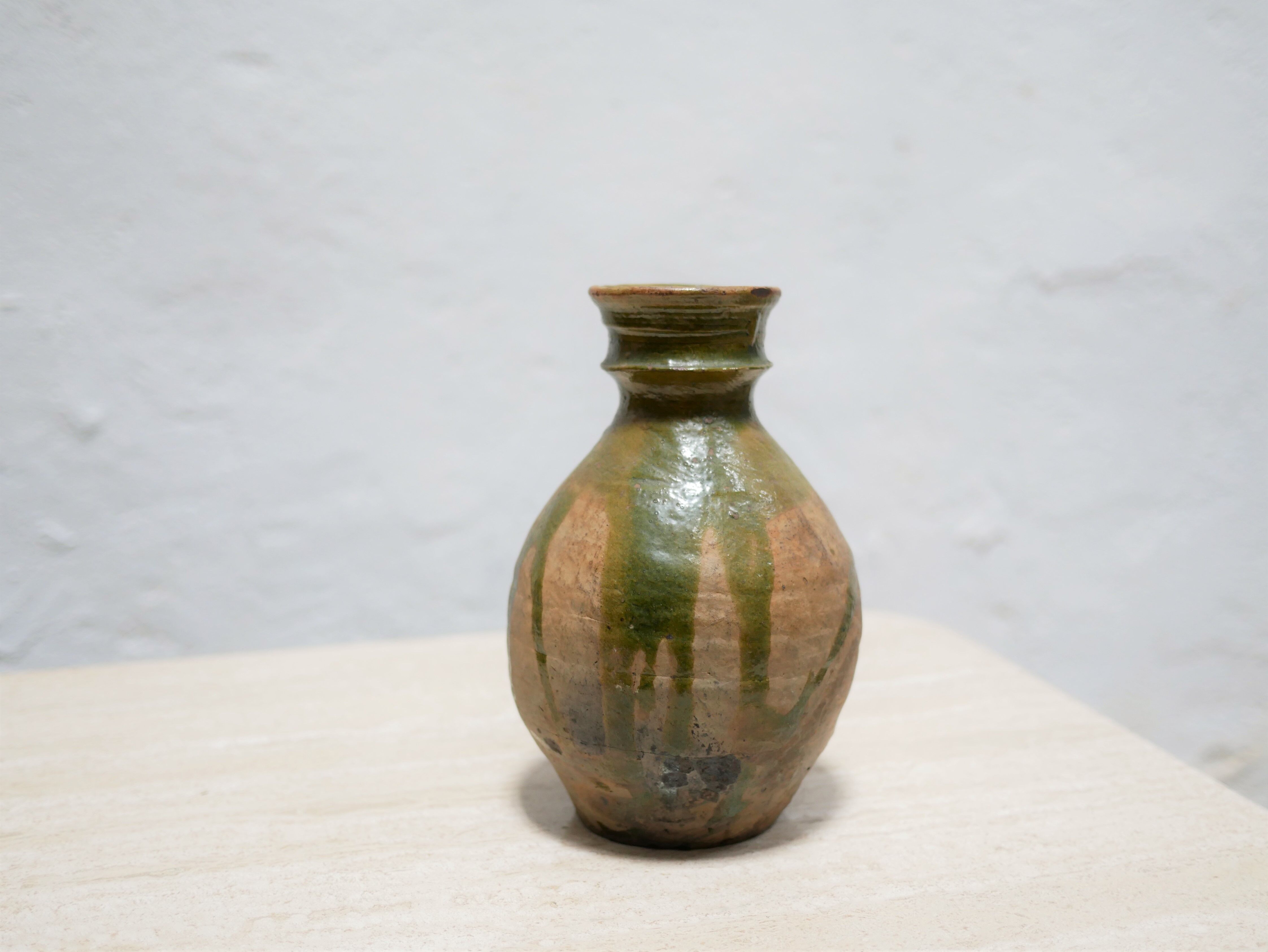 Old glazed terracotta jar