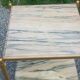 Pair of neoclassical side tables in bronze, brass, marble, and o.
