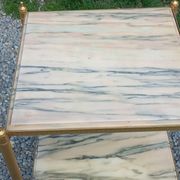 Pair of neoclassical side tables in bronze, brass, marble, and o.