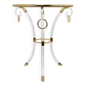 Tripod coffee table in Maison Jansen style in lucite and gold metal.