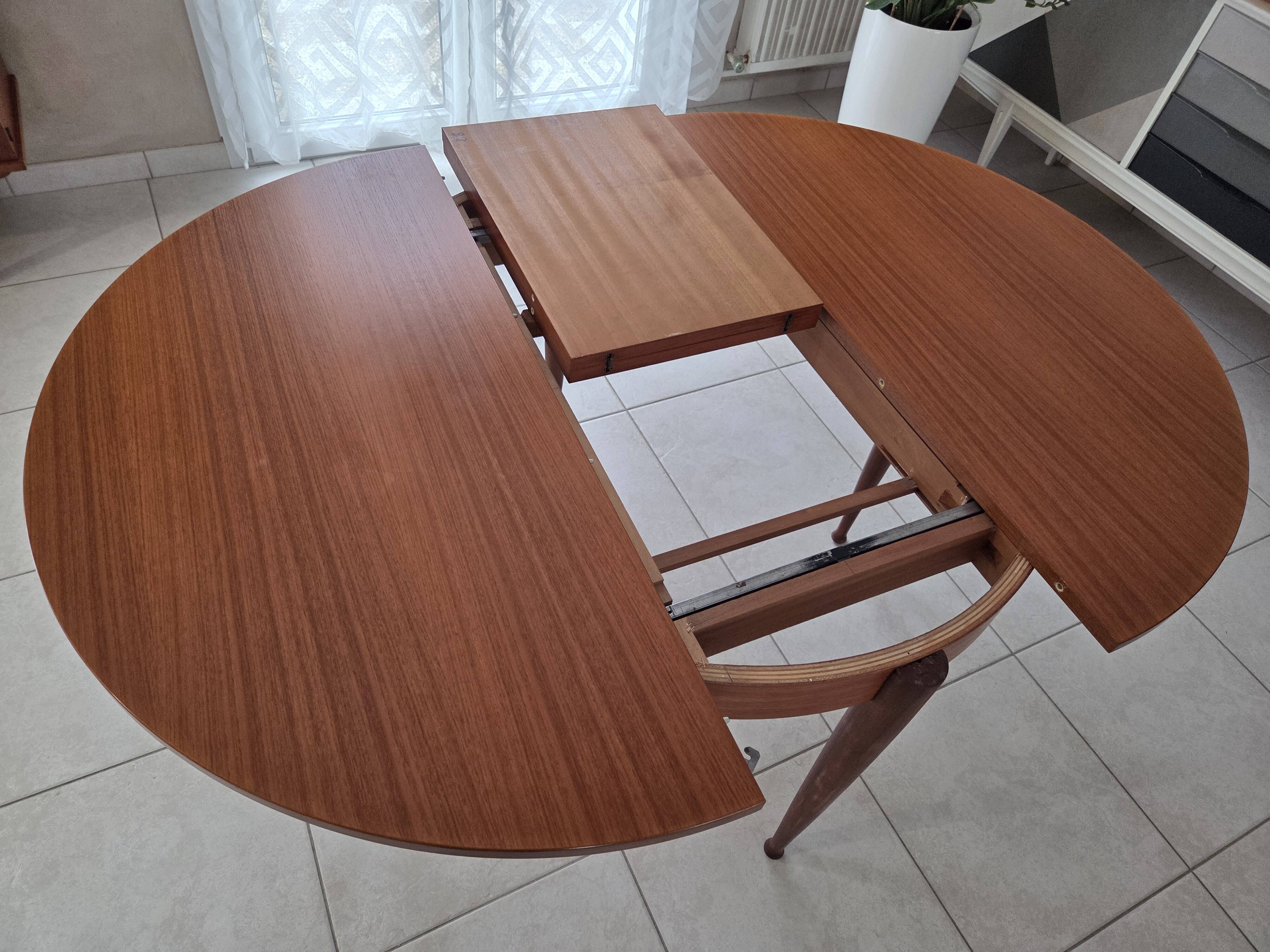 Round teak table in Scandinavian design from the late 1960s.