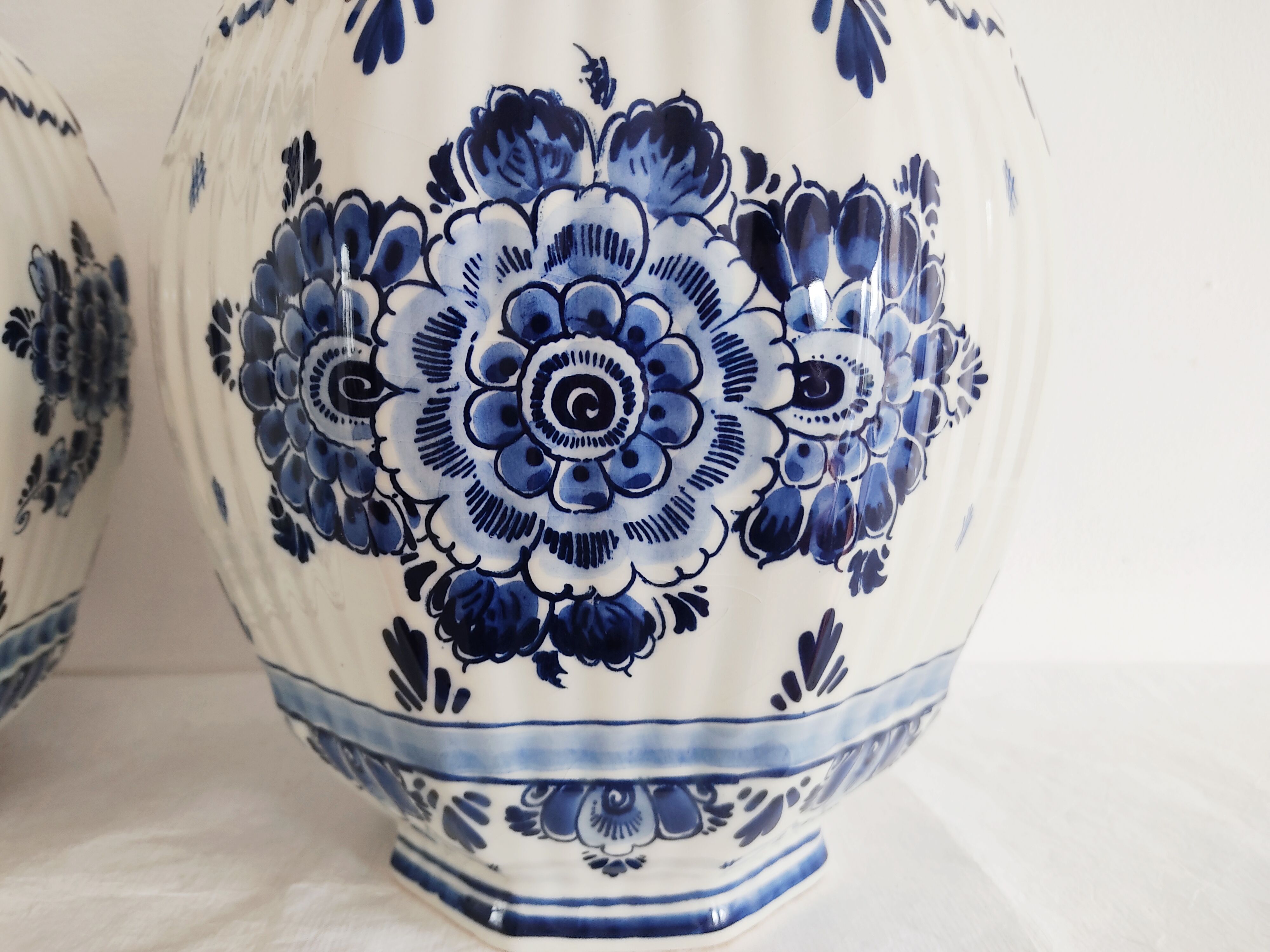 Pair of flowery Delft vases