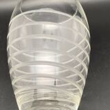 Transparent glass vase with chiseled spiral