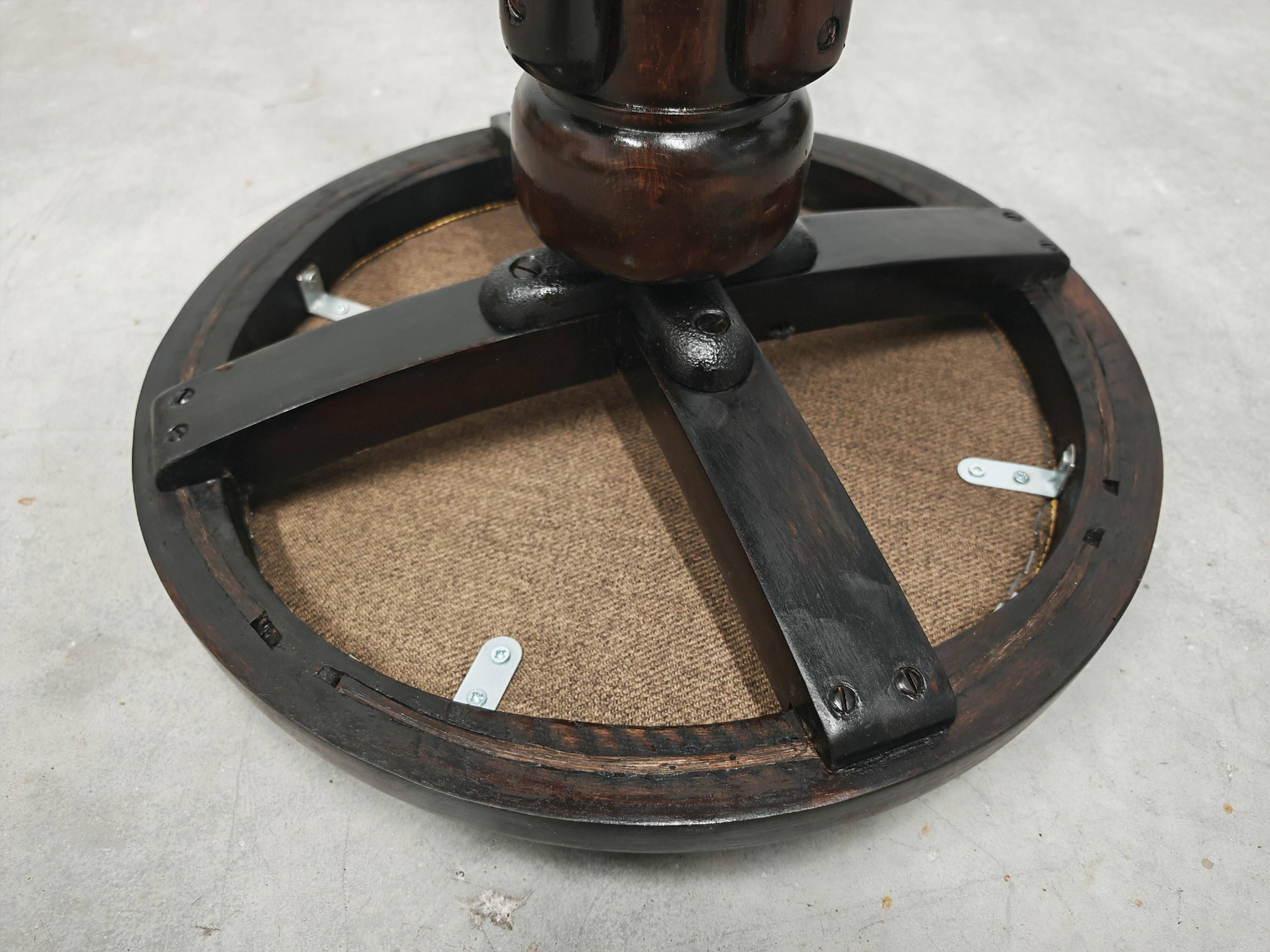 Antique curved wooden piano stool with kilim fabric from the 1910s.