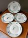 Set of 4 antique dessert plates, Terre de Fer floral pattern.
