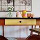 Old wooden farmhouse table and yellow formica top