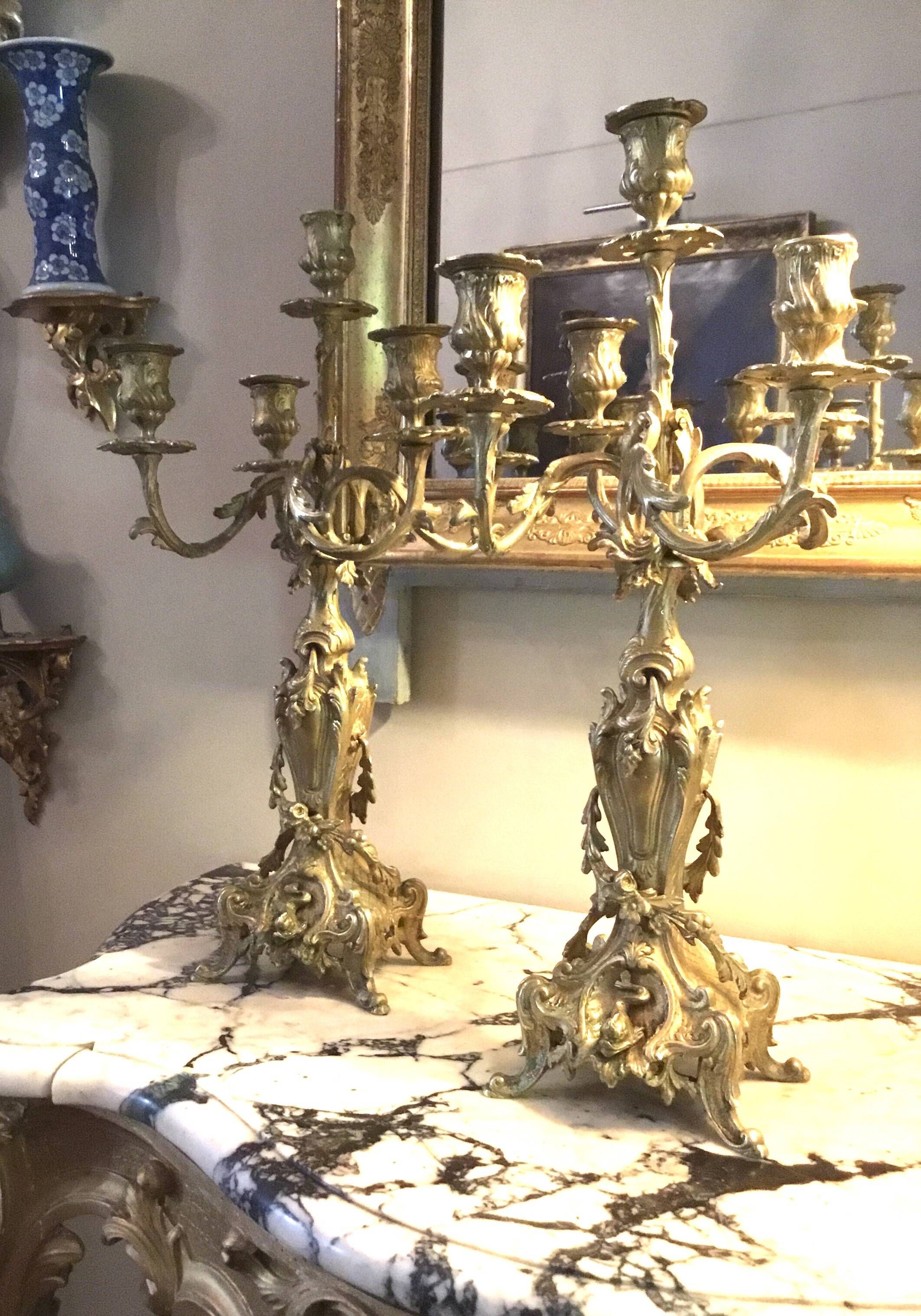 Pair of chiselled and gilded bronze candelabra from the 19th century.
