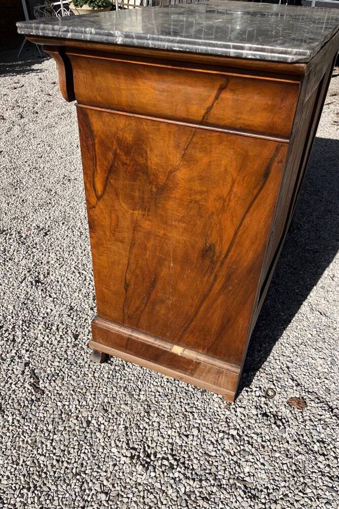 Antique chest of drawers with a grey marble top.